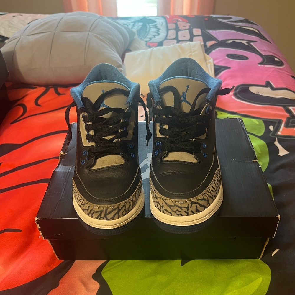Jordan Black and Blue Sneakers with Iconic Design